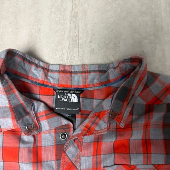 The North Face Orange and Gray Plaid Shirt snaps - Picture 3 of 6